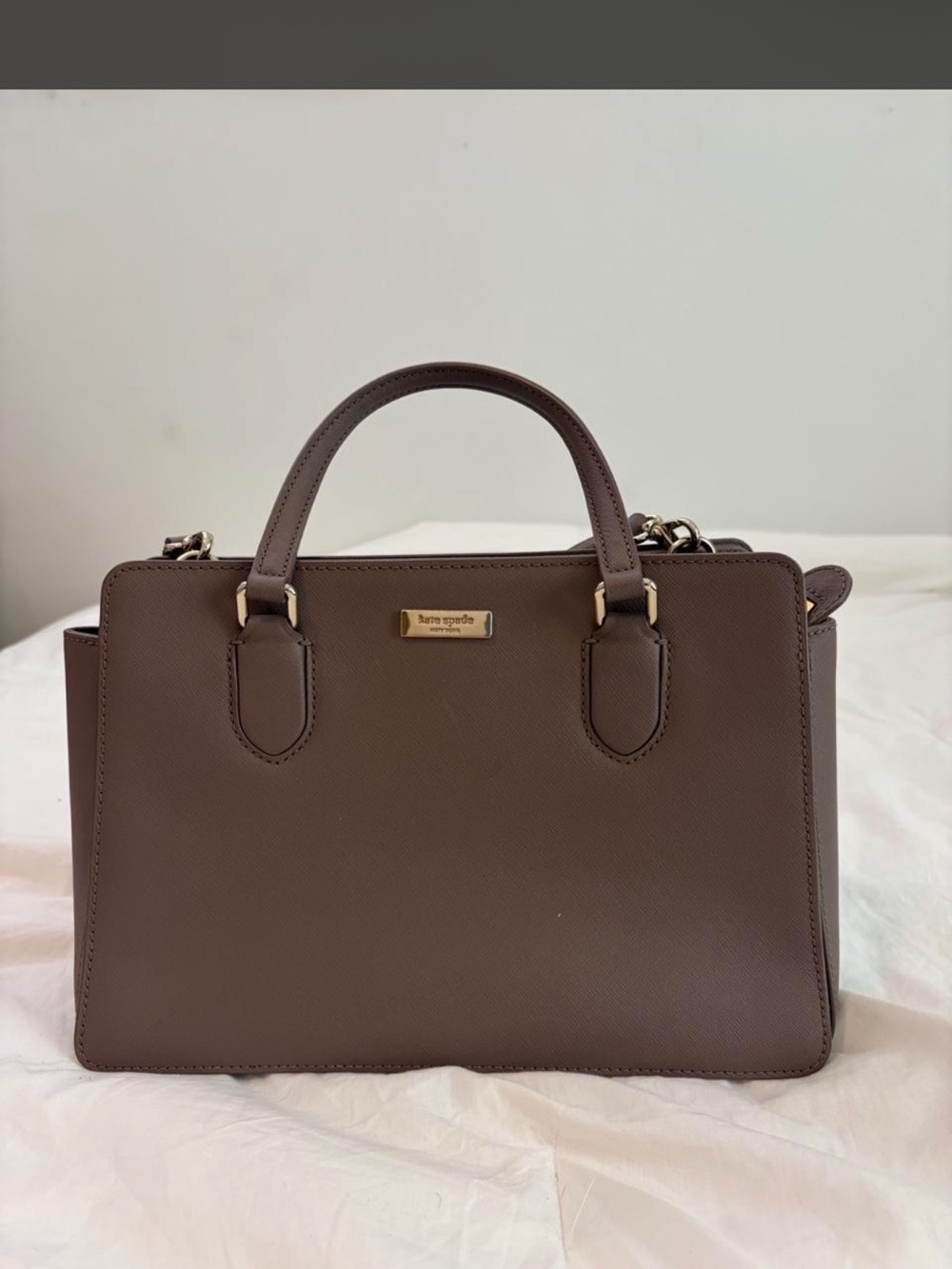 kate spade taupe brown leather satchel with gold-tone plaque